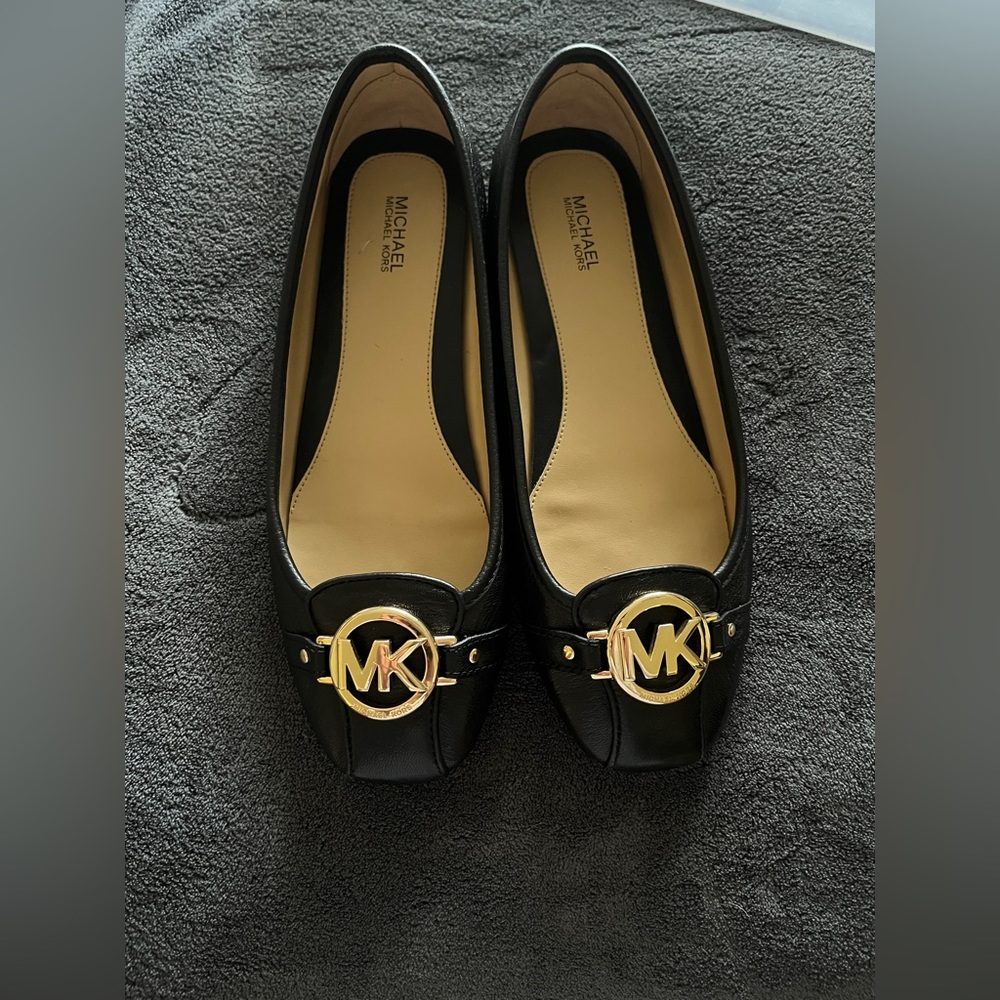 Michael Kors . Black flats